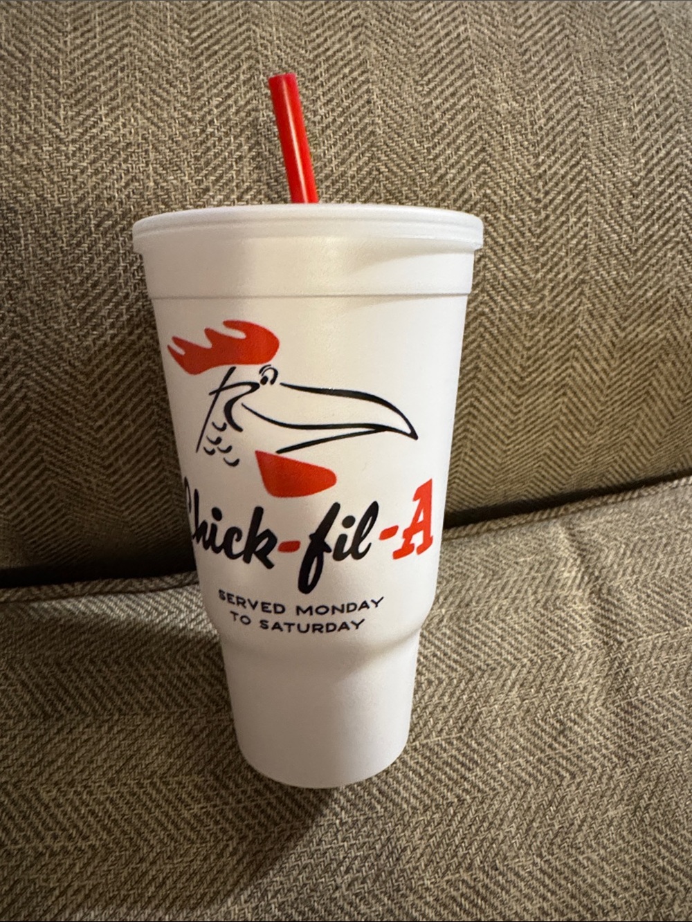 Chick-fil-A branded white/red plastic reusable drinking cup with lid & straw